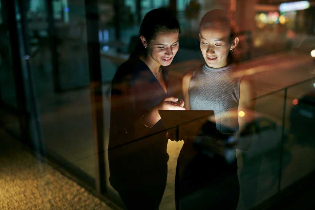 two women conversing