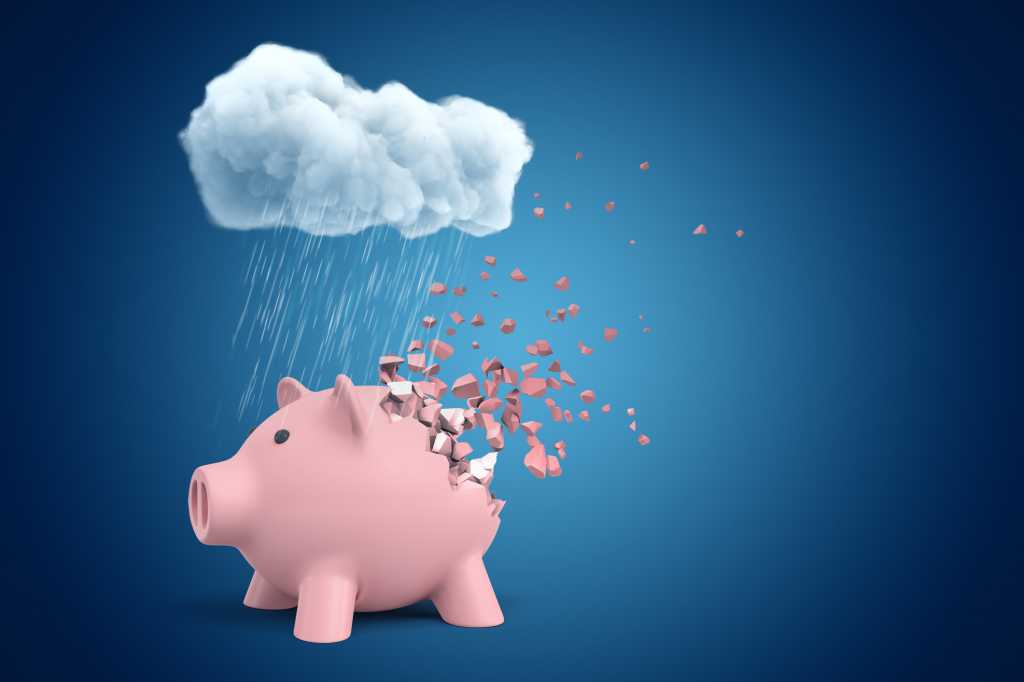 3d rendering of pink piggy bank that is dissolving in pieces, standing under cloud of pouring rain on blue copyspace background.